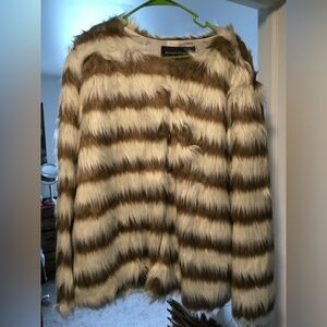 Faux fur coat Tan and cream , Fashionable and soft.